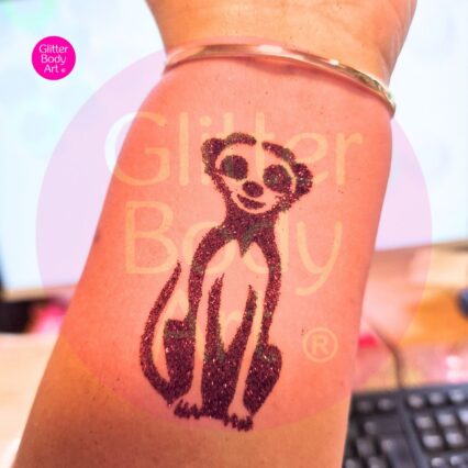 meerkat glitter tattoo with chocolate coloured body glitter